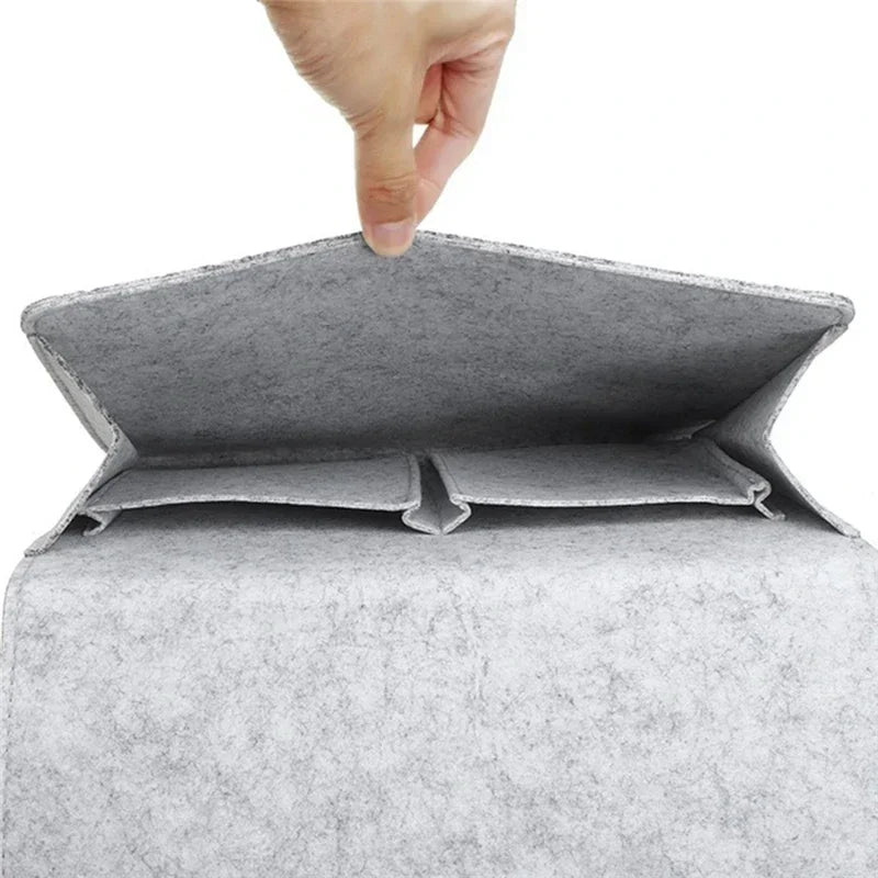 "Multi‑Pocket Felt Bedside Organizer — Hanging Bedside & Sofa Side Pouch for Phones, Remotes & Books" - LuxeHome Furniture