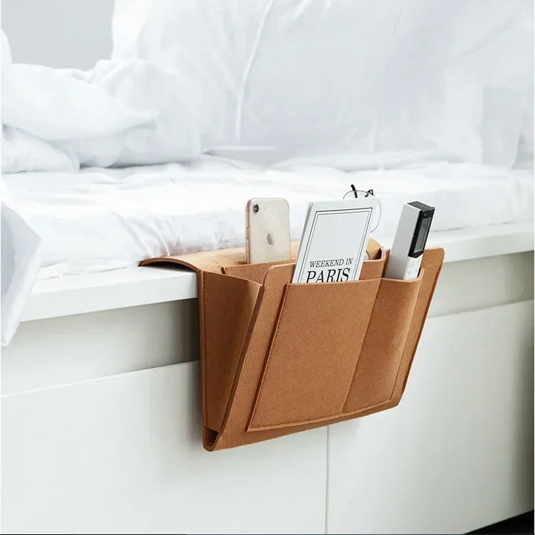 "Multi‑Pocket Felt Bedside Organizer — Hanging Bedside & Sofa Side Pouch for Phones, Remotes & Books" - LuxeHome Furniture